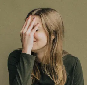 embarrassed female