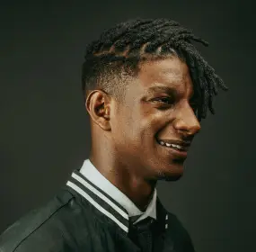 side profile smiling man